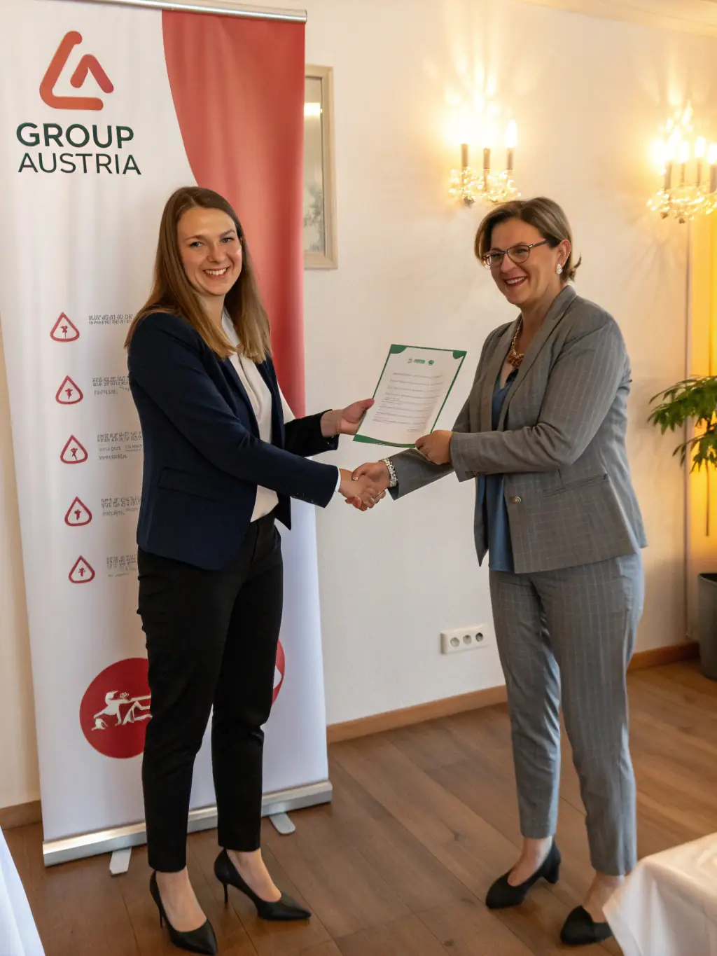 An image of an executive receiving positive feedback and recognition from their team, highlighting the impact of effective leadership.